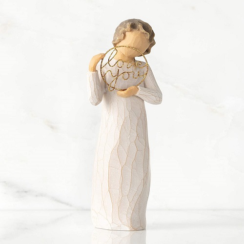 Figurine holding love for mom